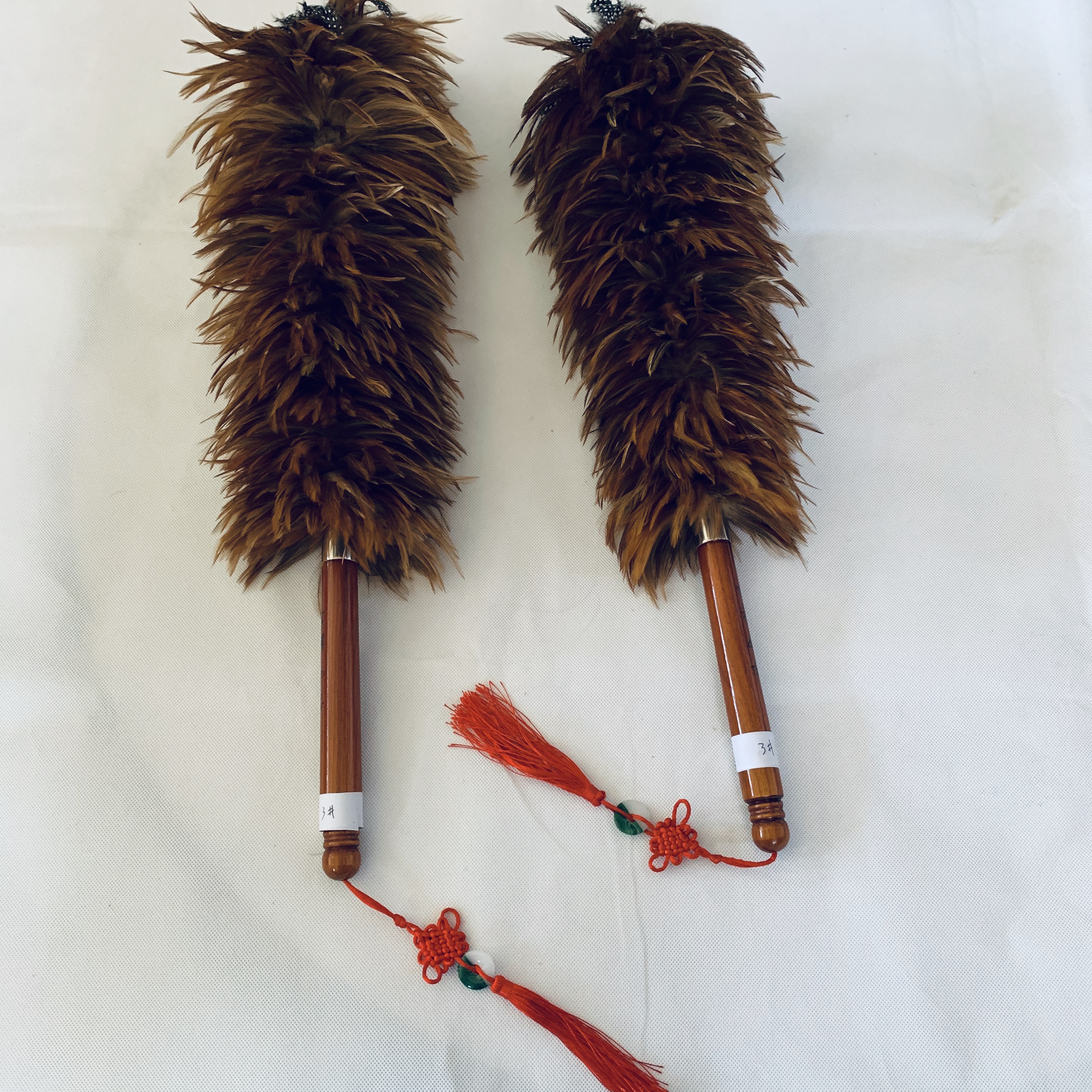 Rooster feather duster with small handle and chinese knot