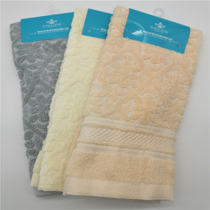 Solid Jacquard towel with satin border