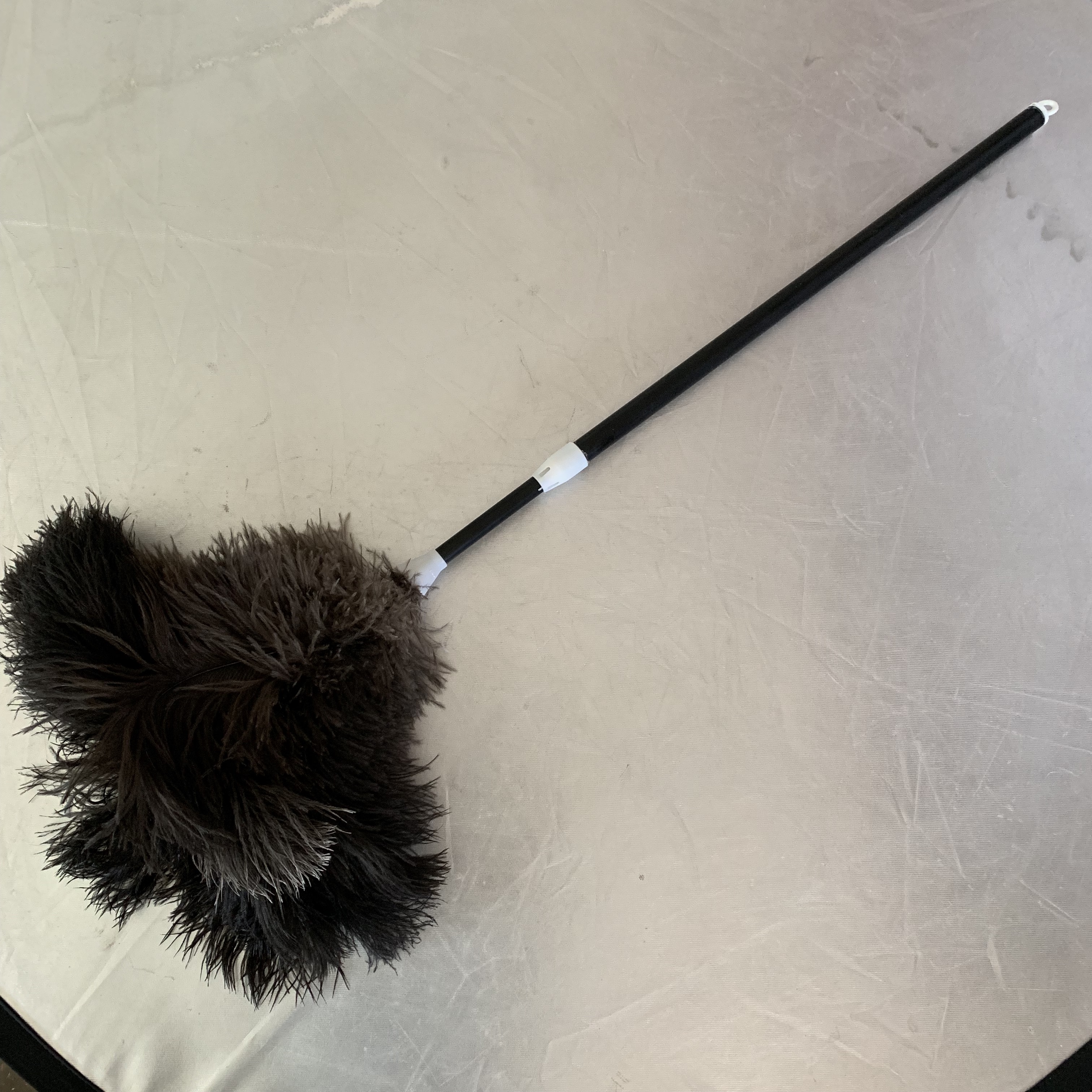 Black ostrich feather duster with long retractable pp handle