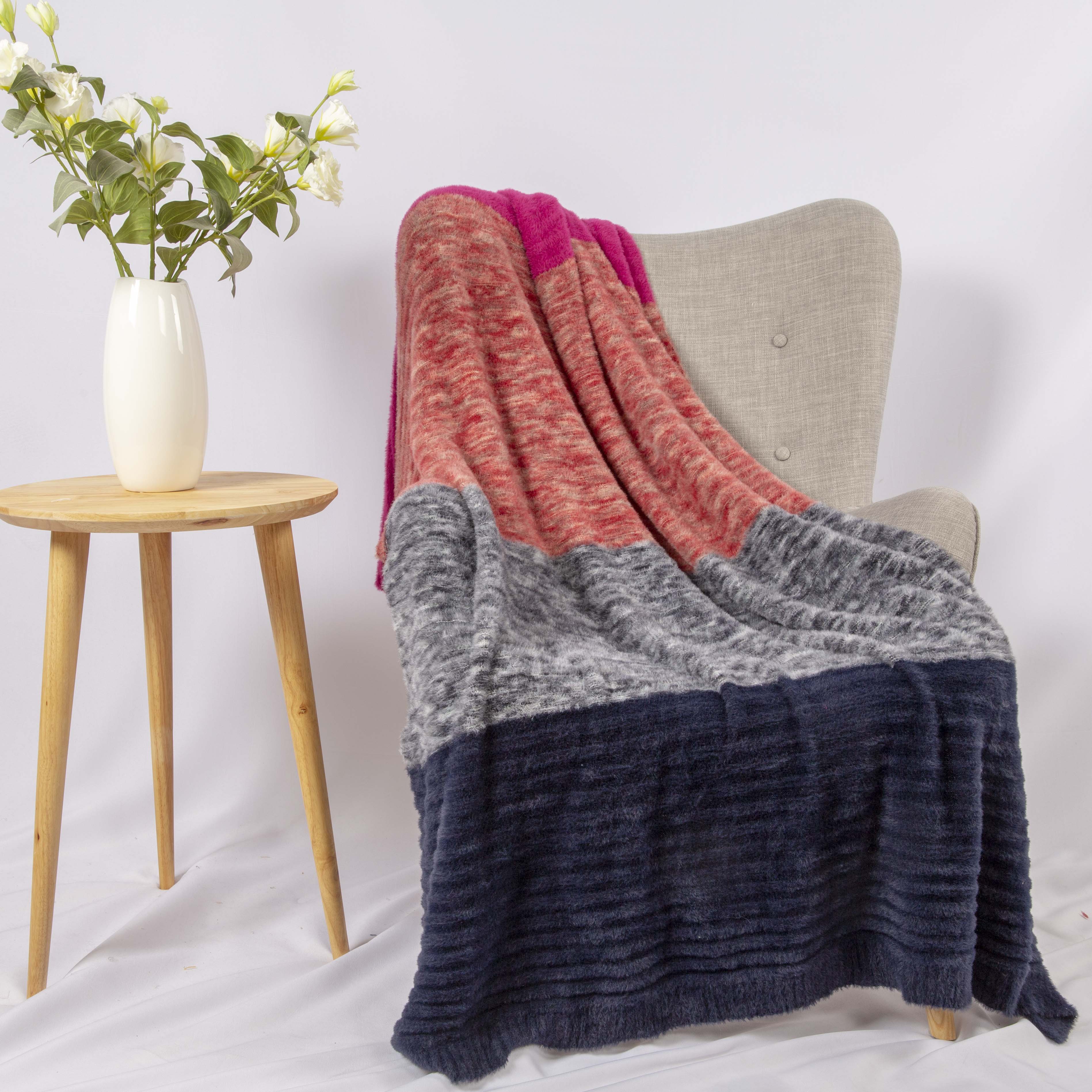 Faux fur knitting throw
