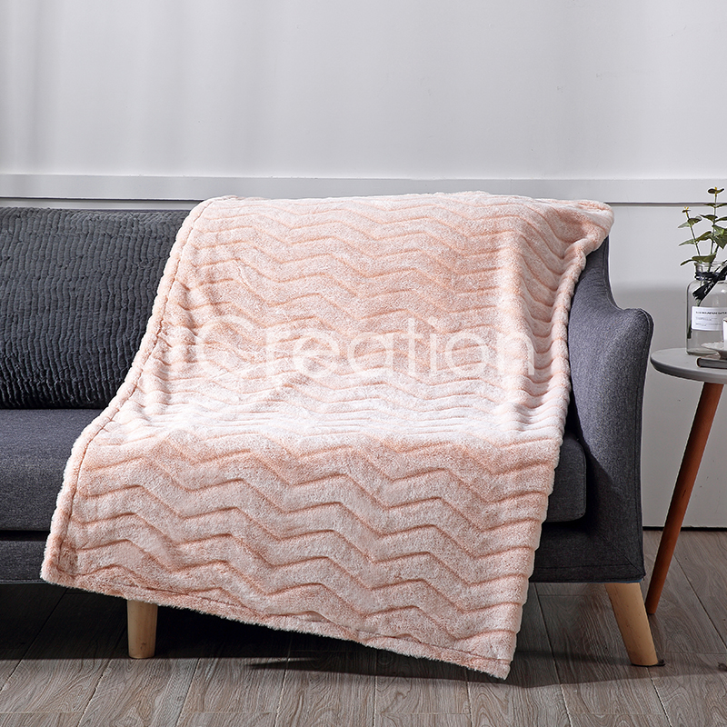 Base print faux rabbit fur with sheared pattern throw