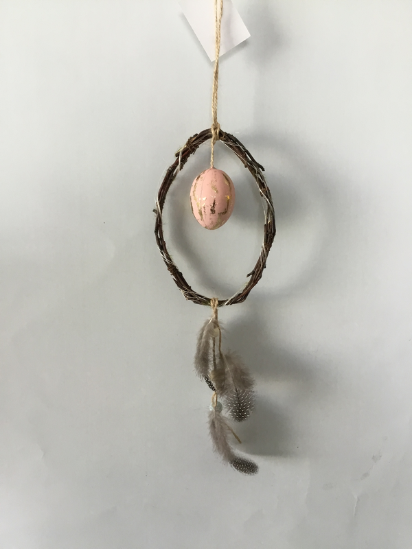 Twig hanger with egg and feather