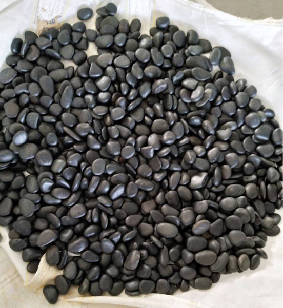 Black color flat and small polished pebble stone for garden decorative and landscape