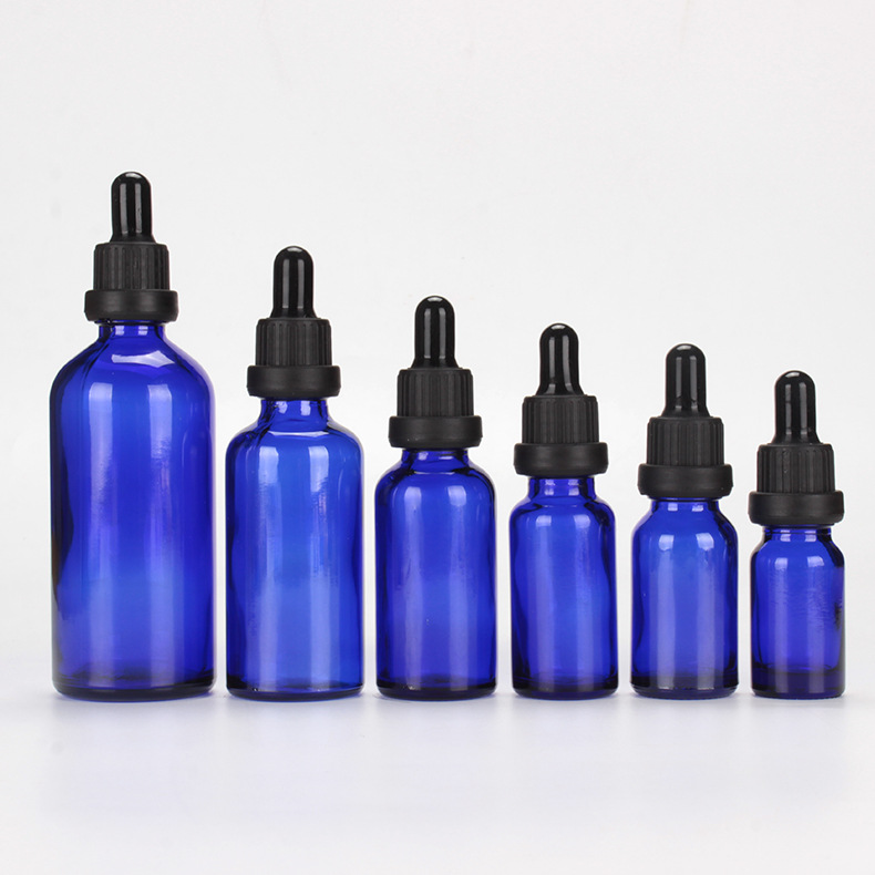 Blue essential oil glass bottle