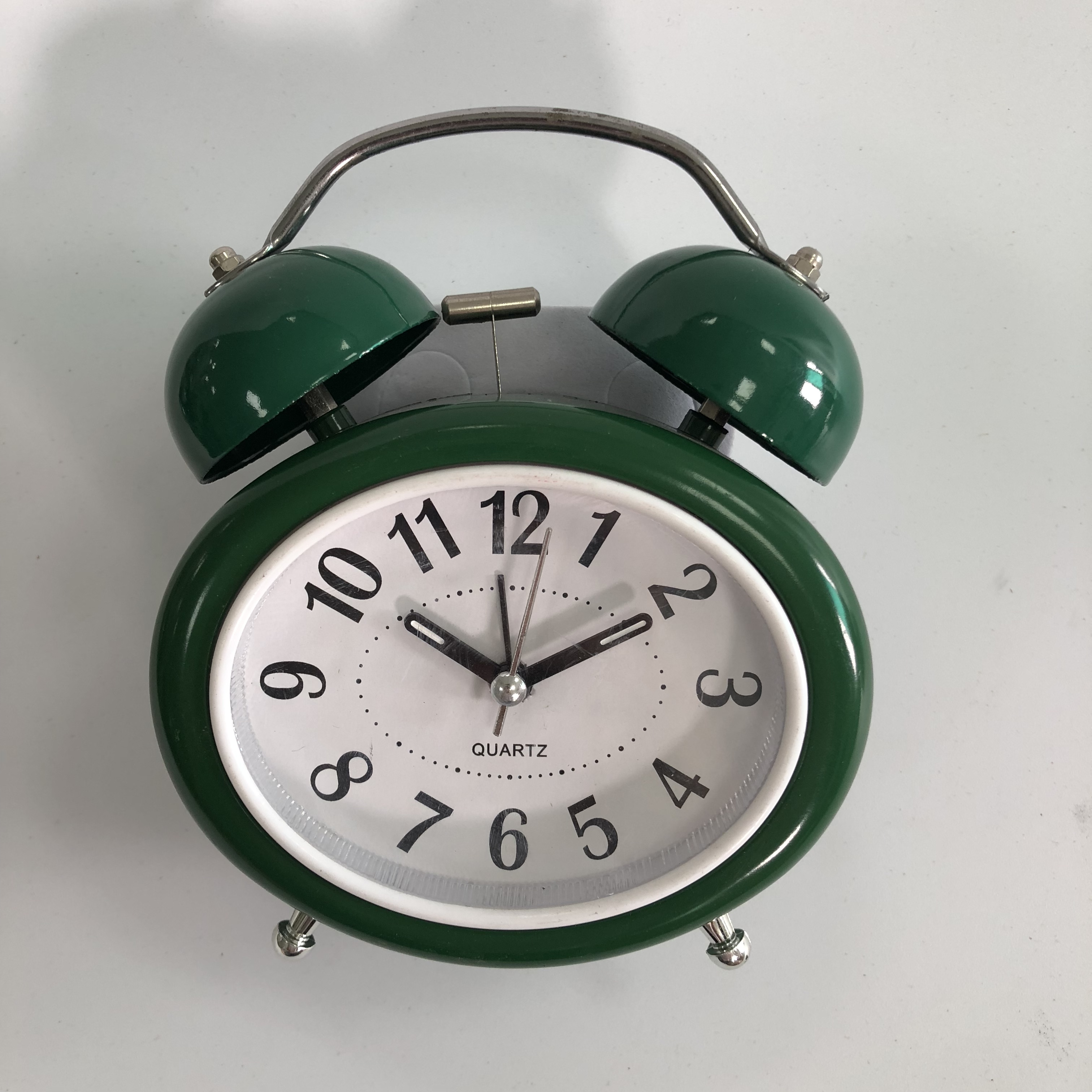 oval-shaped twin bell alarm clock