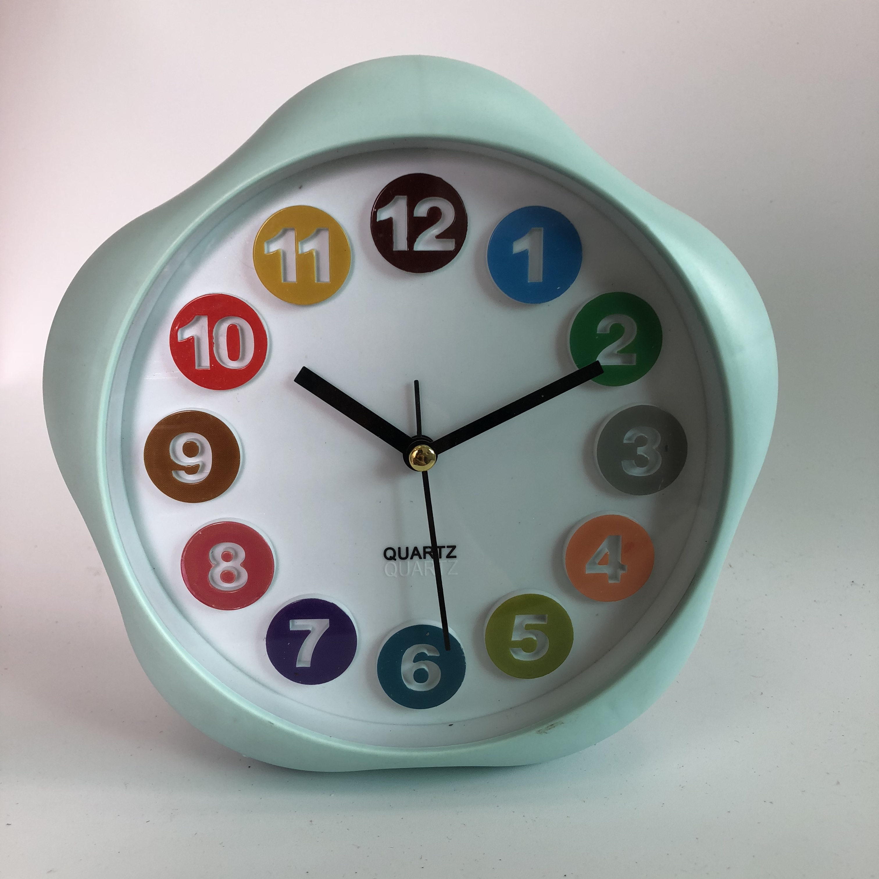 Plastic flower shaped raised number kids alarm clock