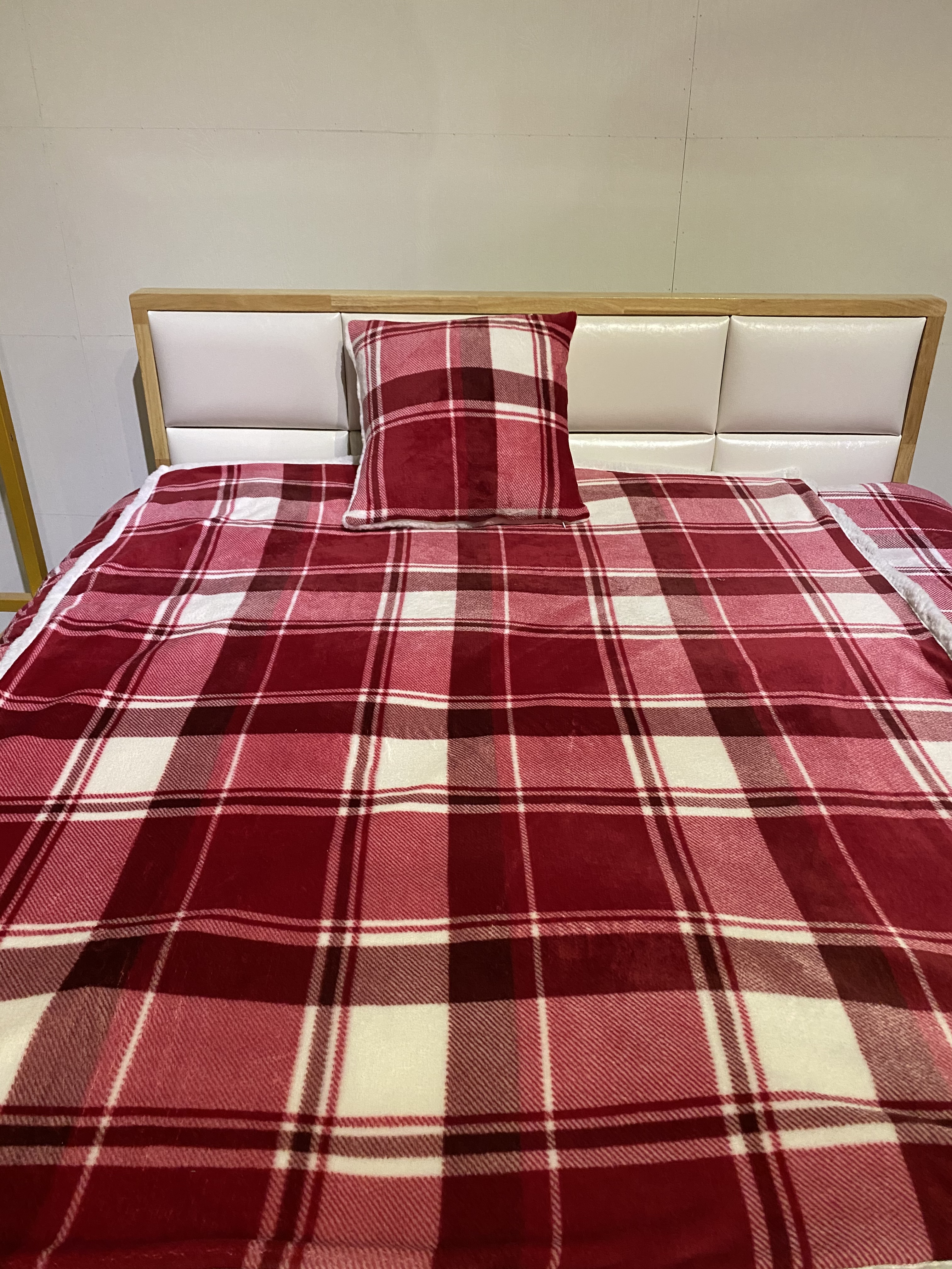 Plain red checked flannel blanket