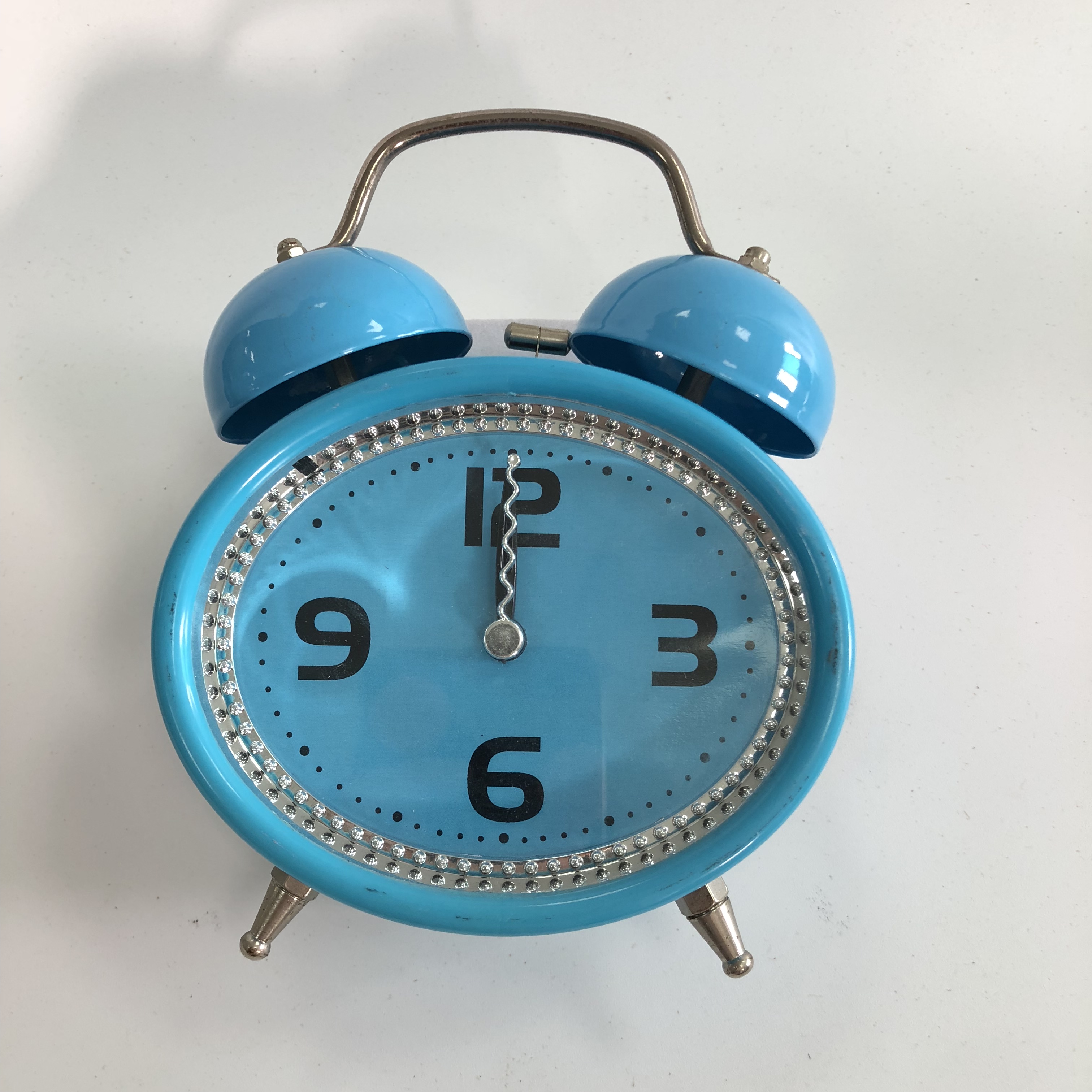 Colorful oval-shaped twin bell alarm clock