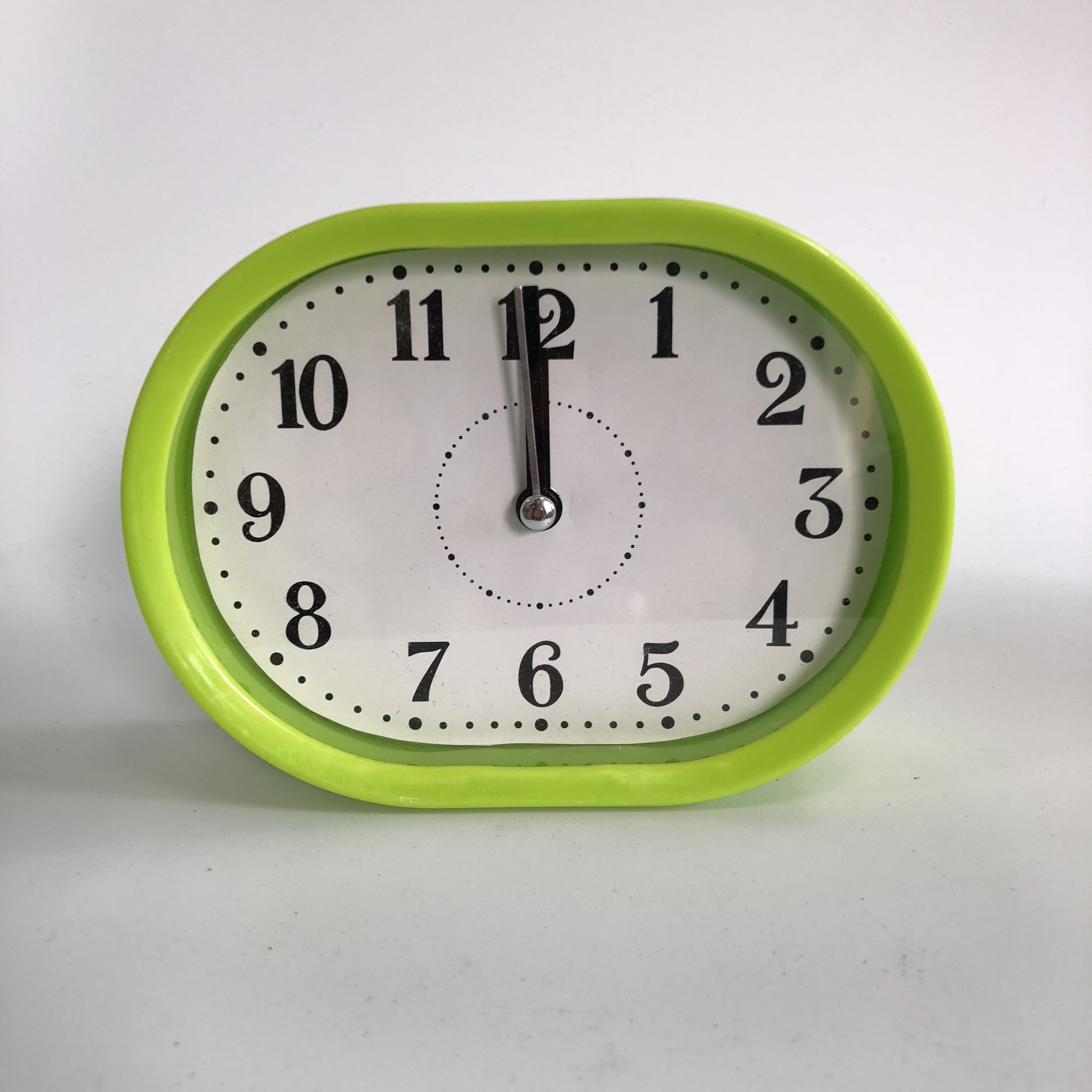 Plastic oval alarm clock
