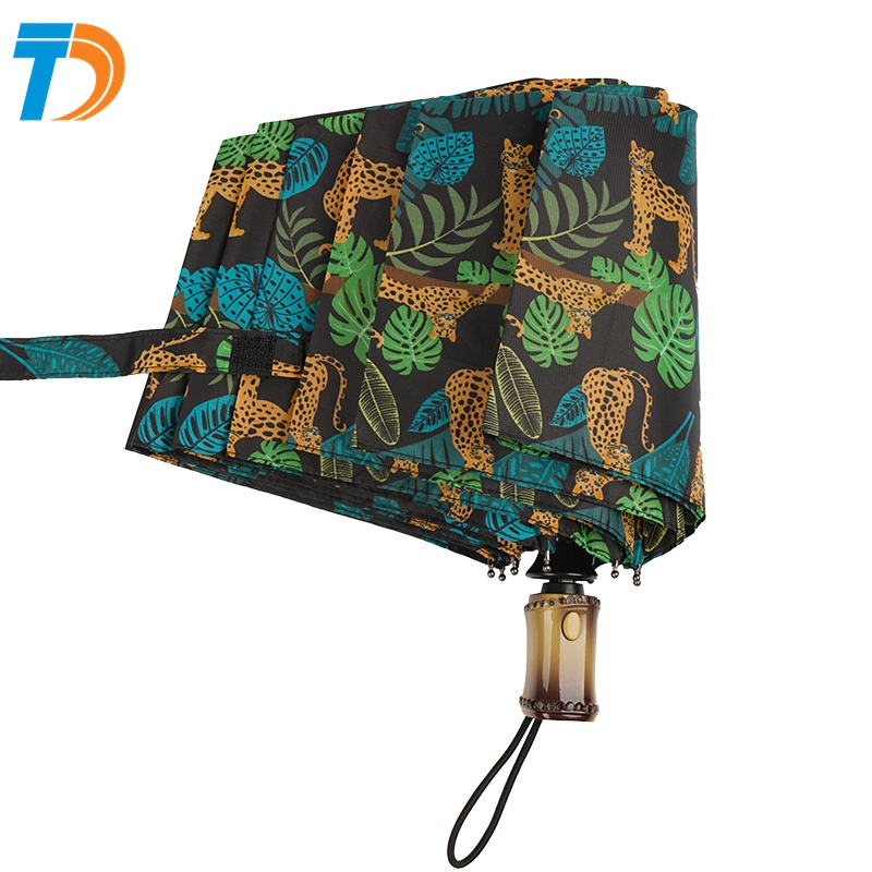 Three-fold automatic opening and closing umbrella
