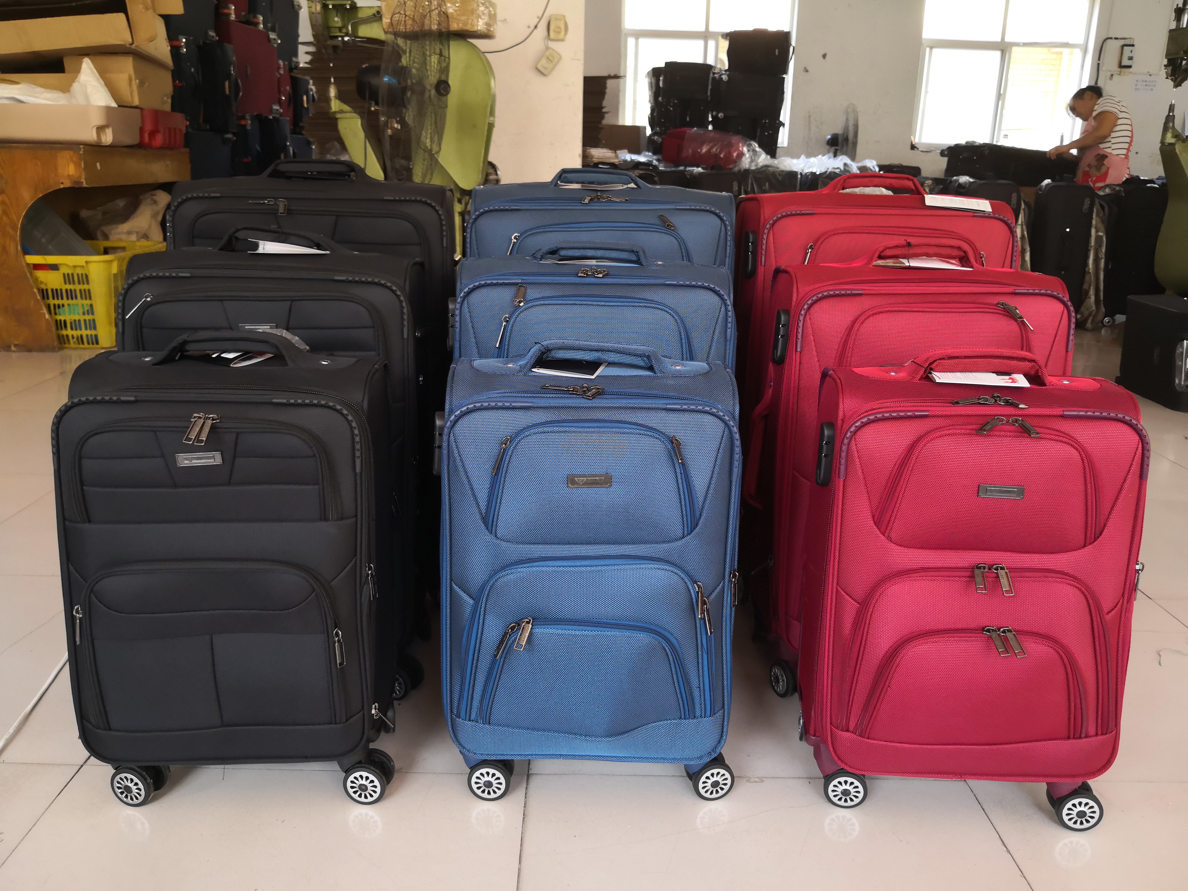 Wholesale cheap casual 4 spinner wheels 20 24 28 inch travel cross nylon luggage set