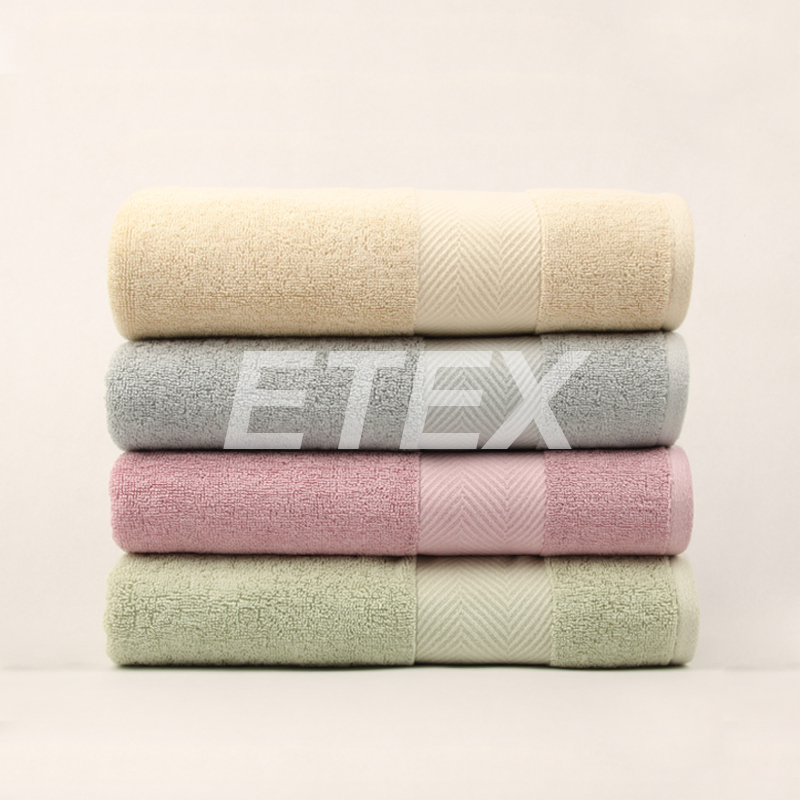 solid towel with dobby border