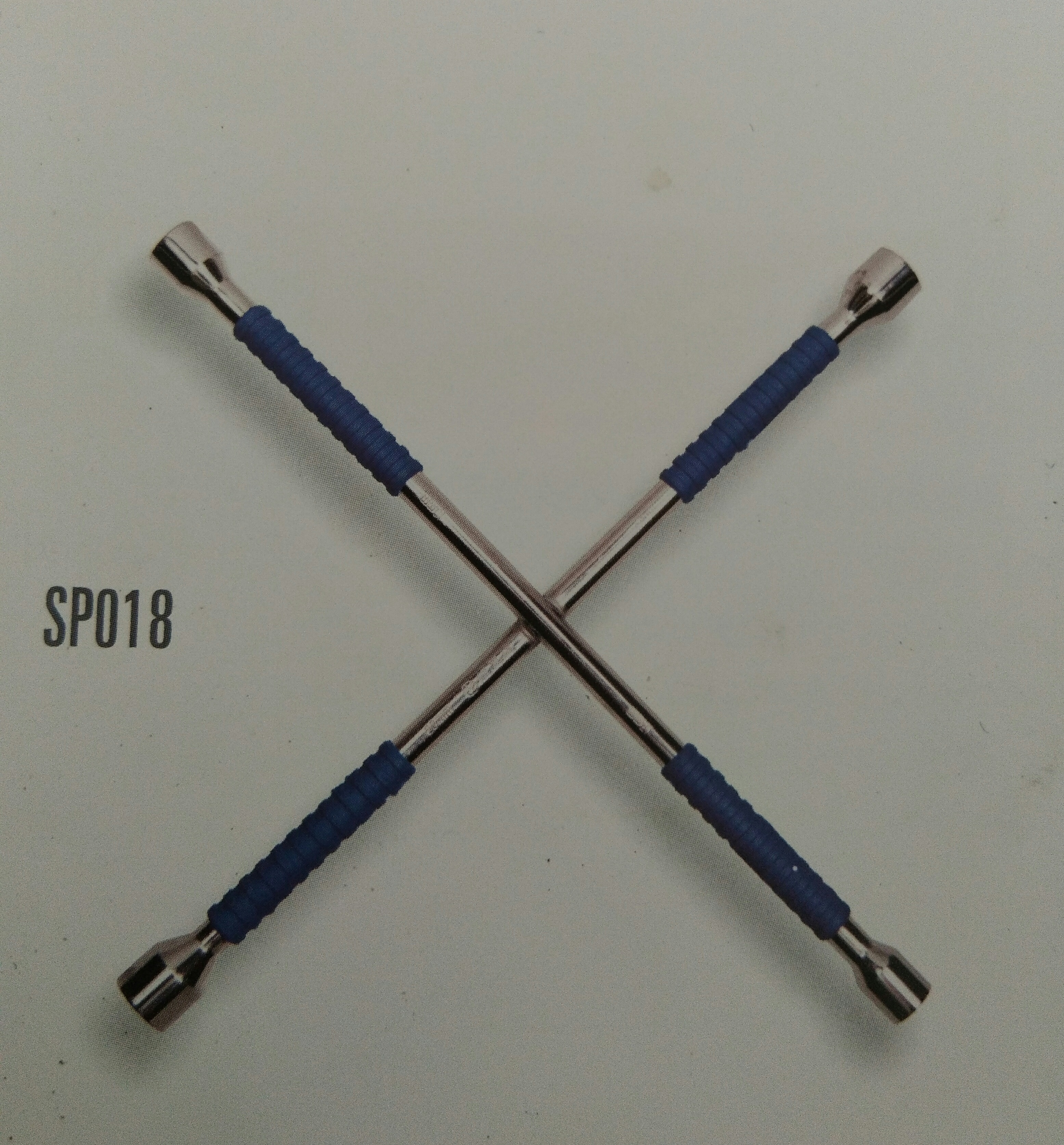 Cross rim wrench with plastic handle