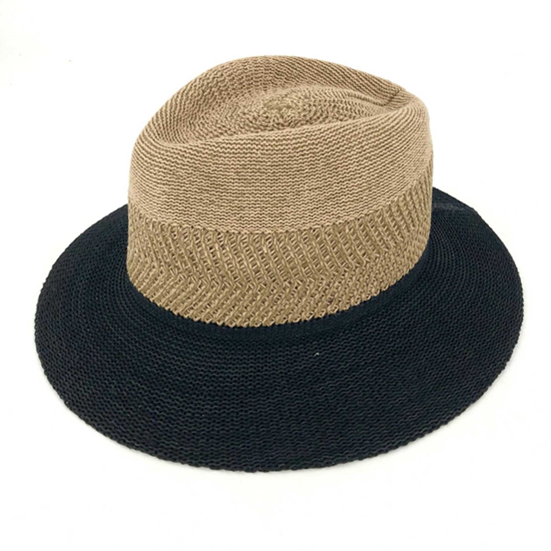 man's setting straw hat