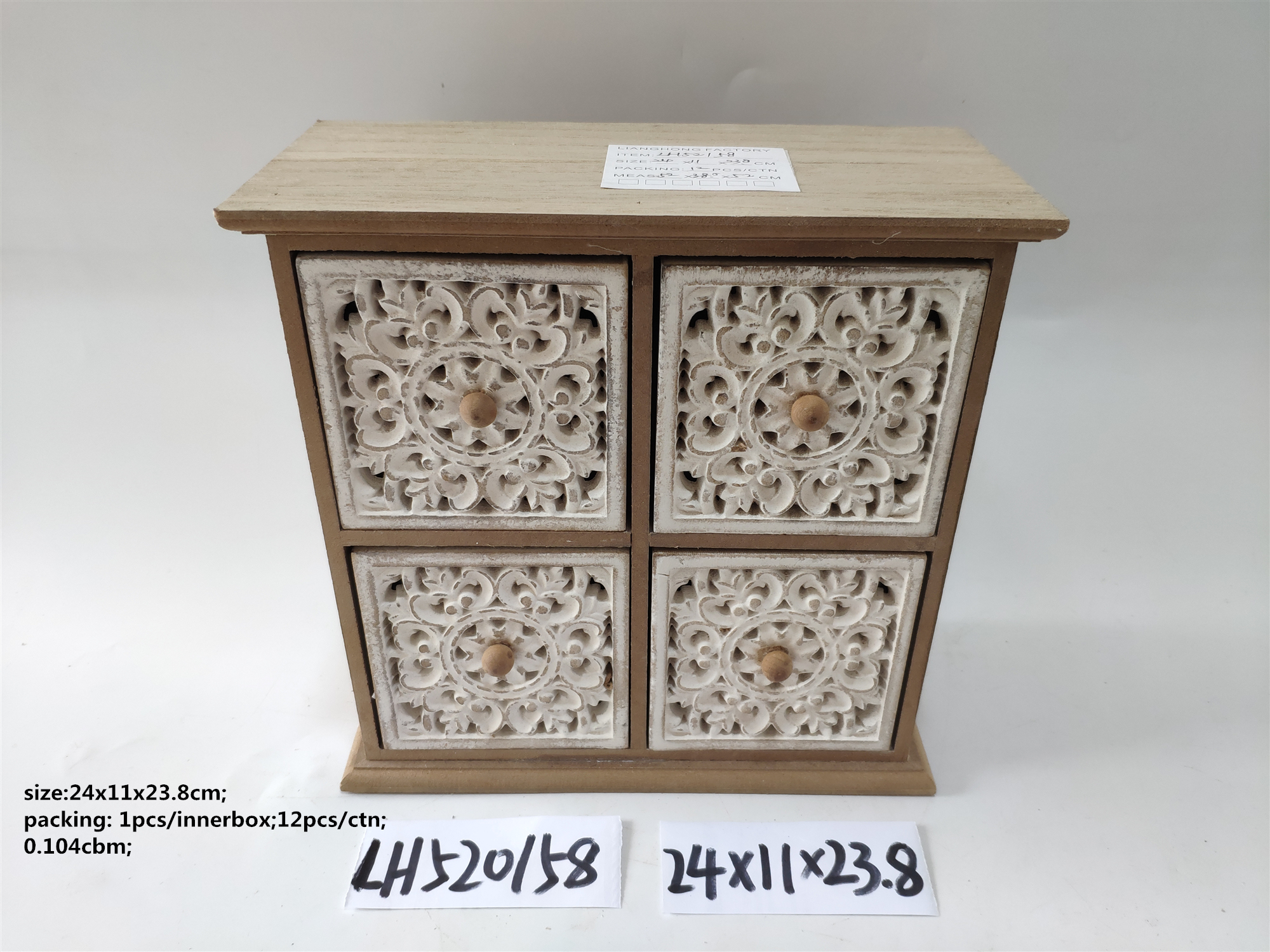 Small wooden cabinet with four drawers in ancient style and embossed pattern