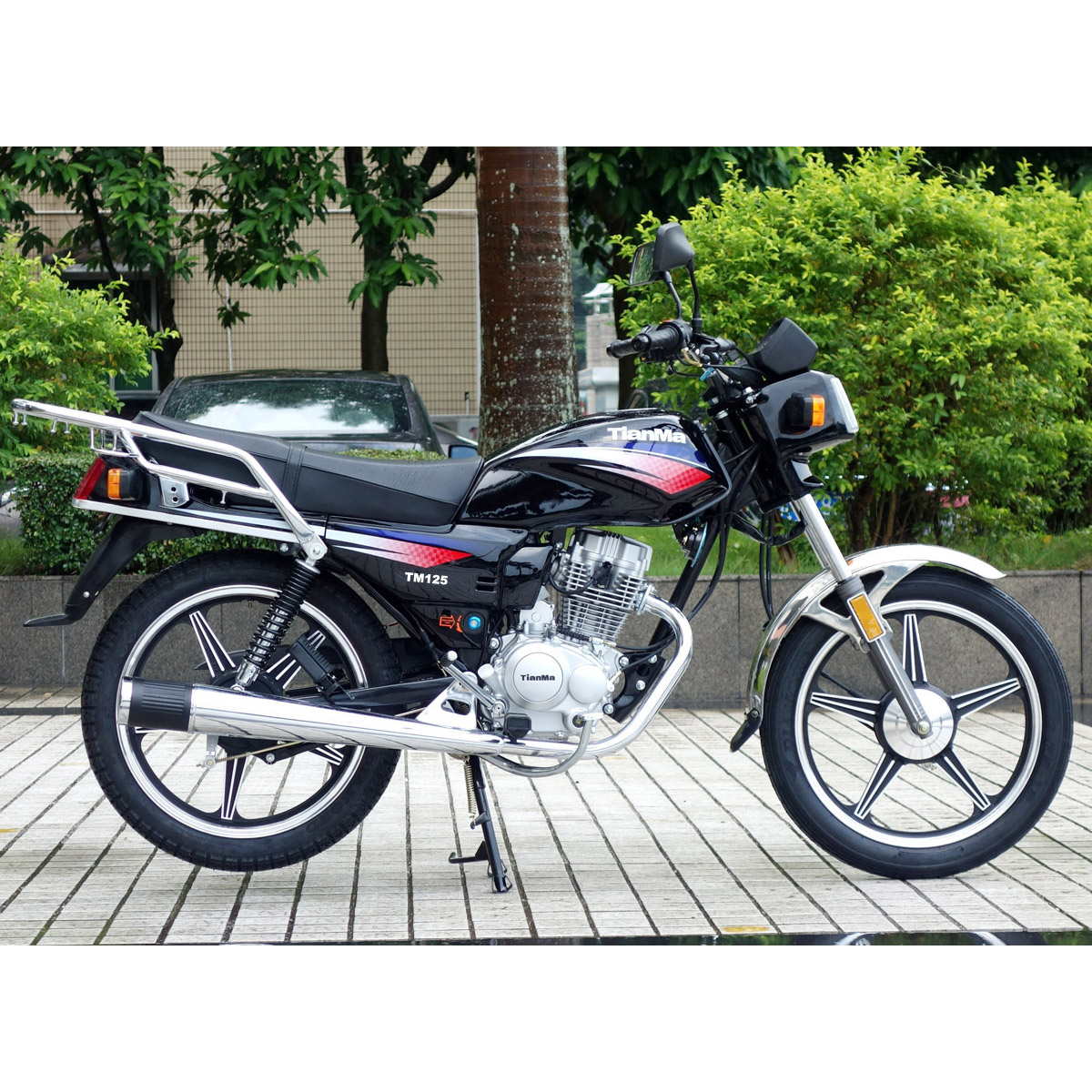 TM125