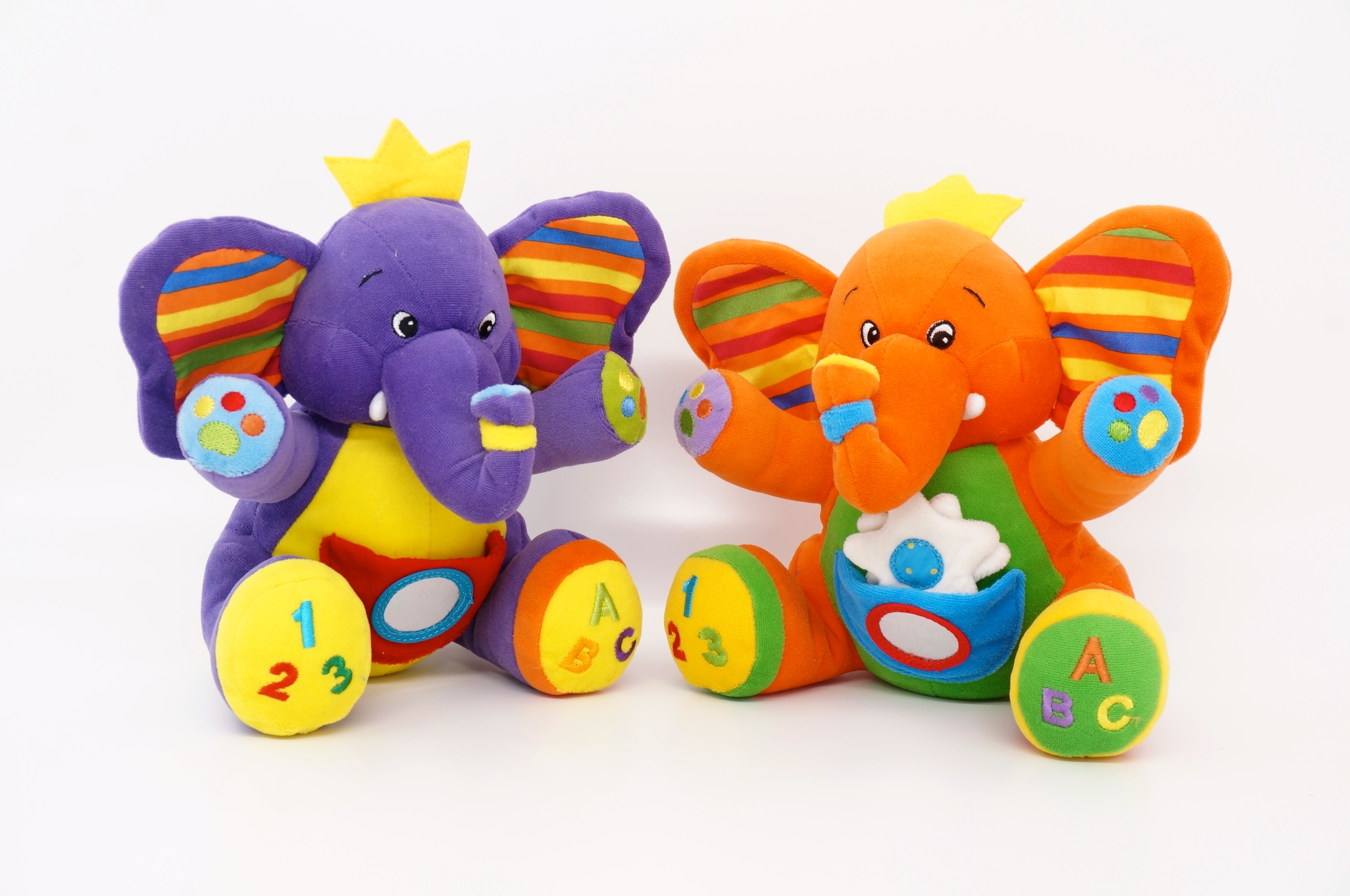 baby elephant with crinkle paper, rattle, mirror, and vibration