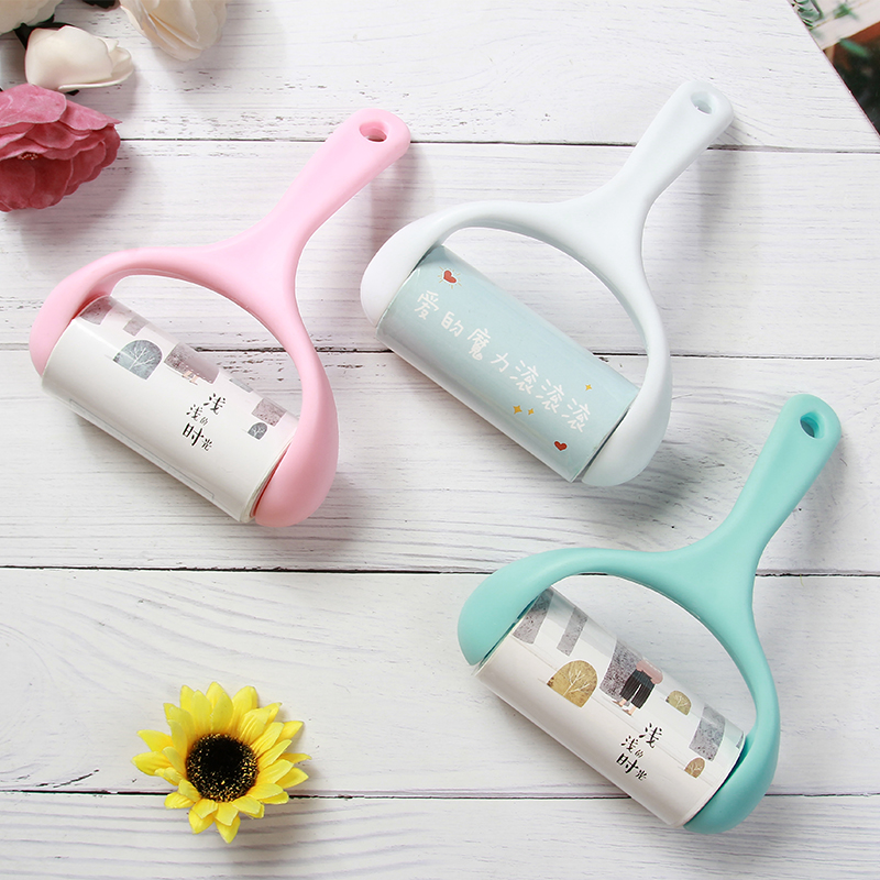 Bent handle design lint roller