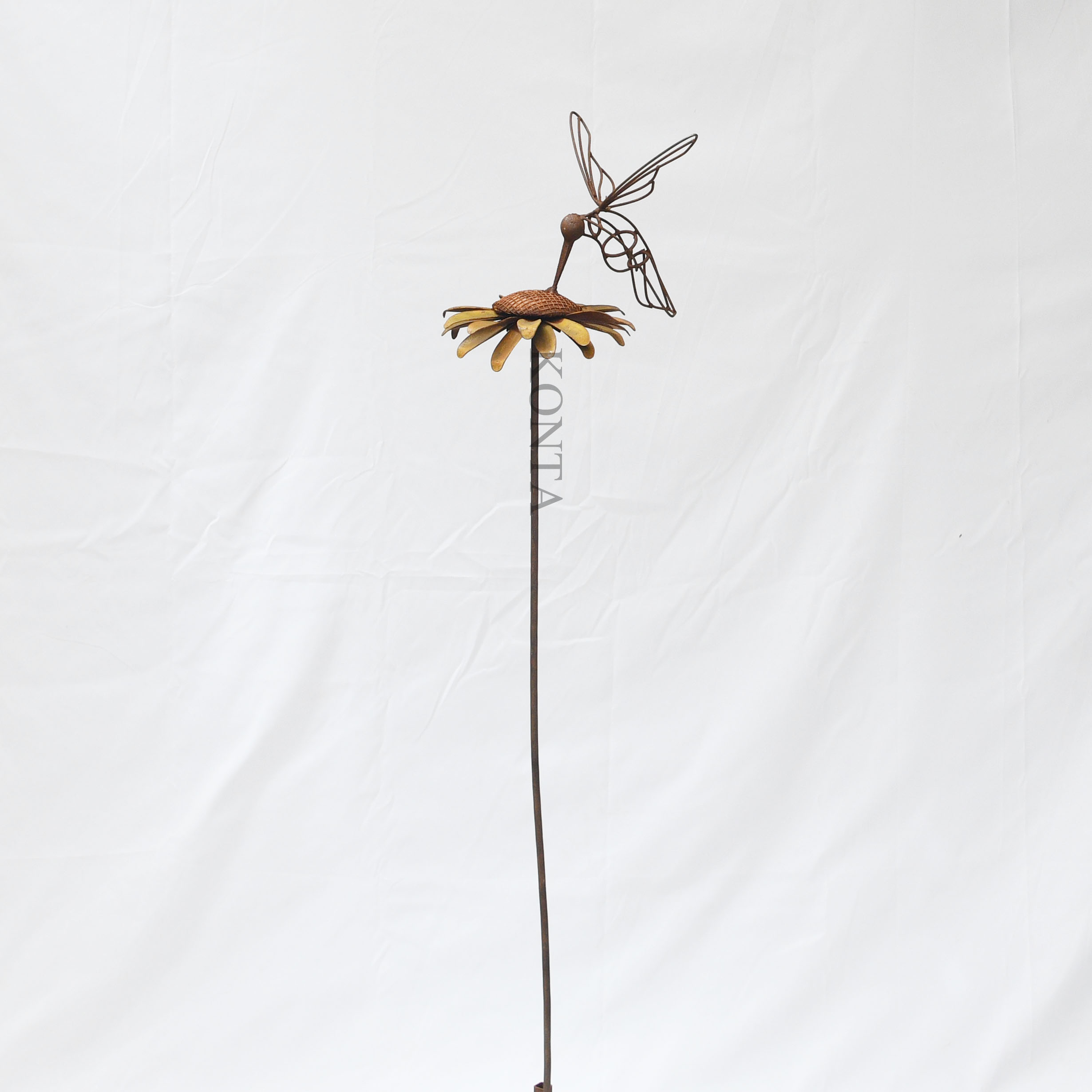 Tin oxeye with hummer stake