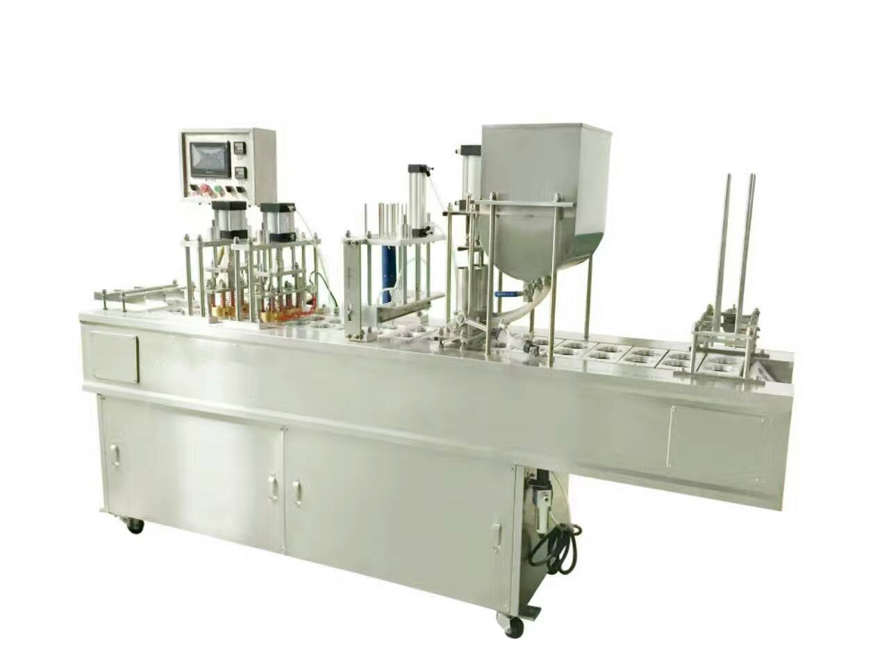 Plastic cup filling and sealing machine
