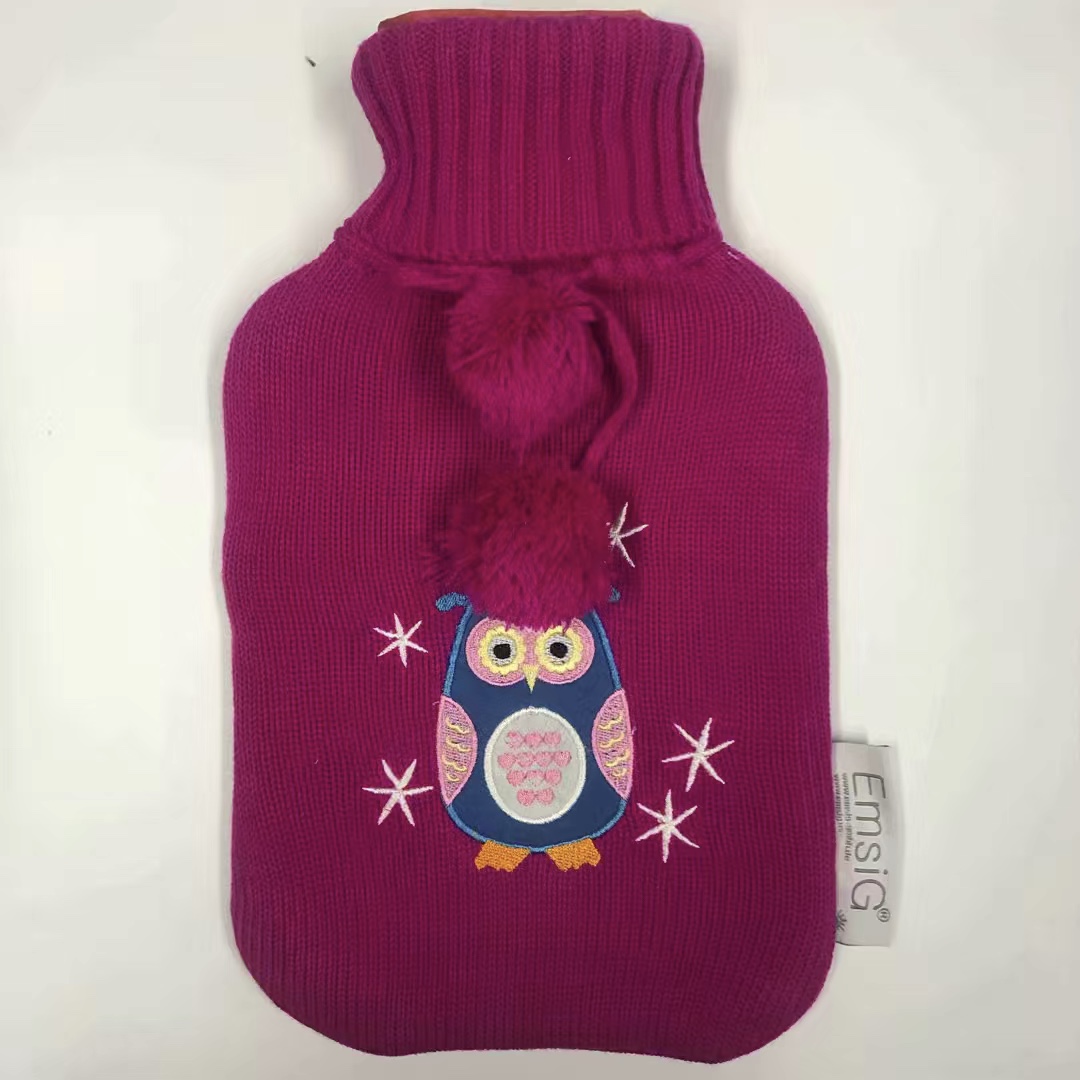 Rubber hot water bottle with knitted cover