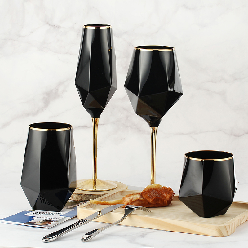 Black wine glasses with gold rim
