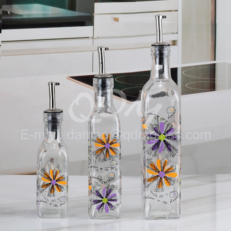 glass oil bottle with decor