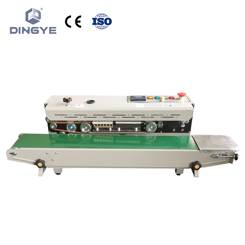 Continuous band sealer with gas flushing