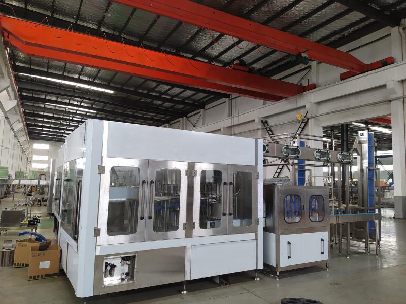 Washing filling and capping three in one machine