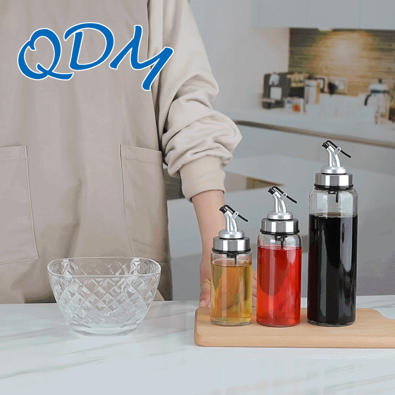 Glass oil bottle with plastic lid