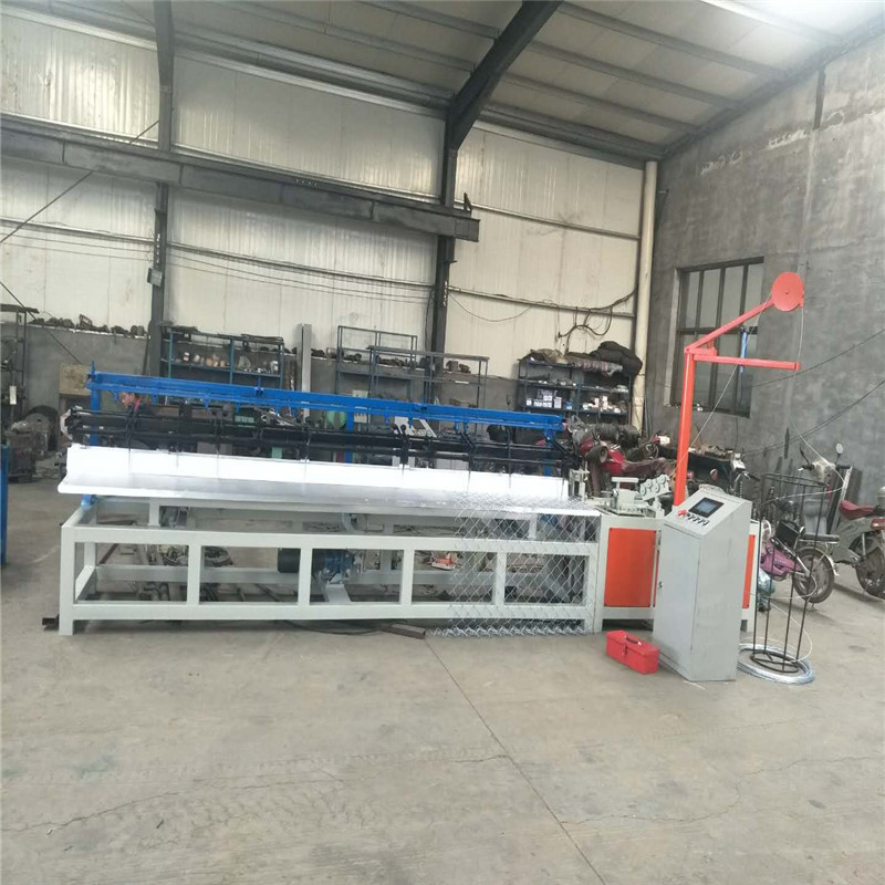 Semi automatic chain link fence machine