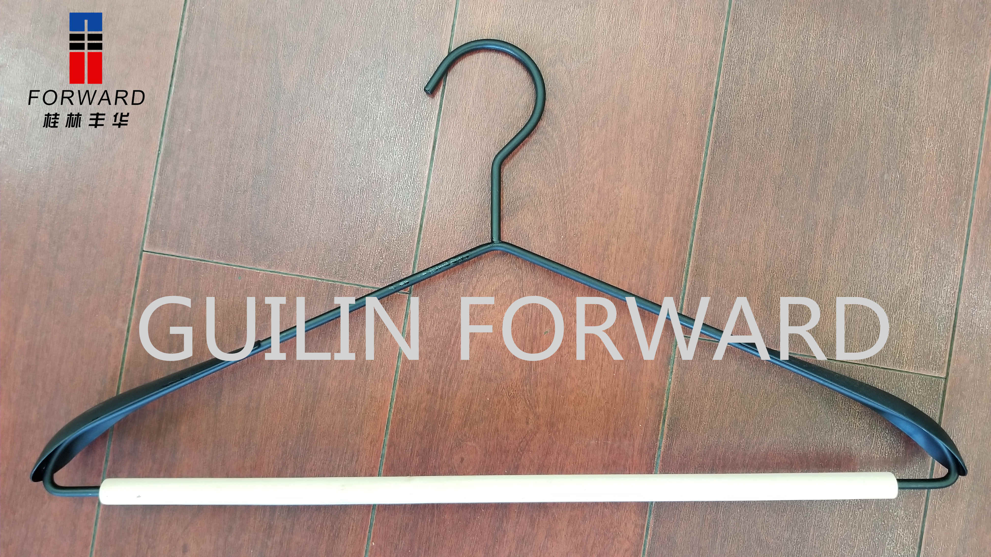 Metal hanger with wood
