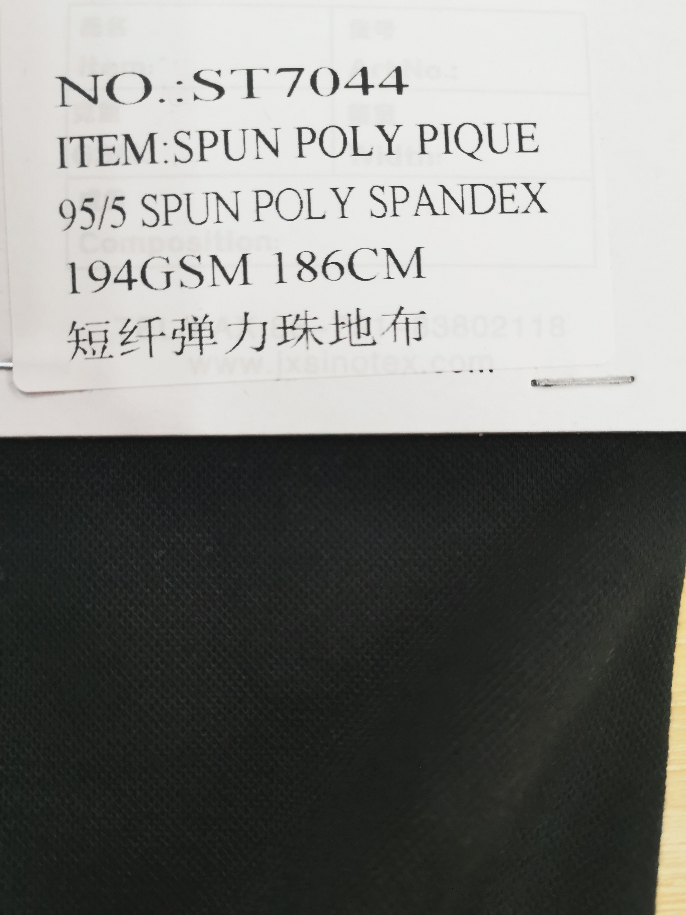 95% Spun Poly 5% Spandex