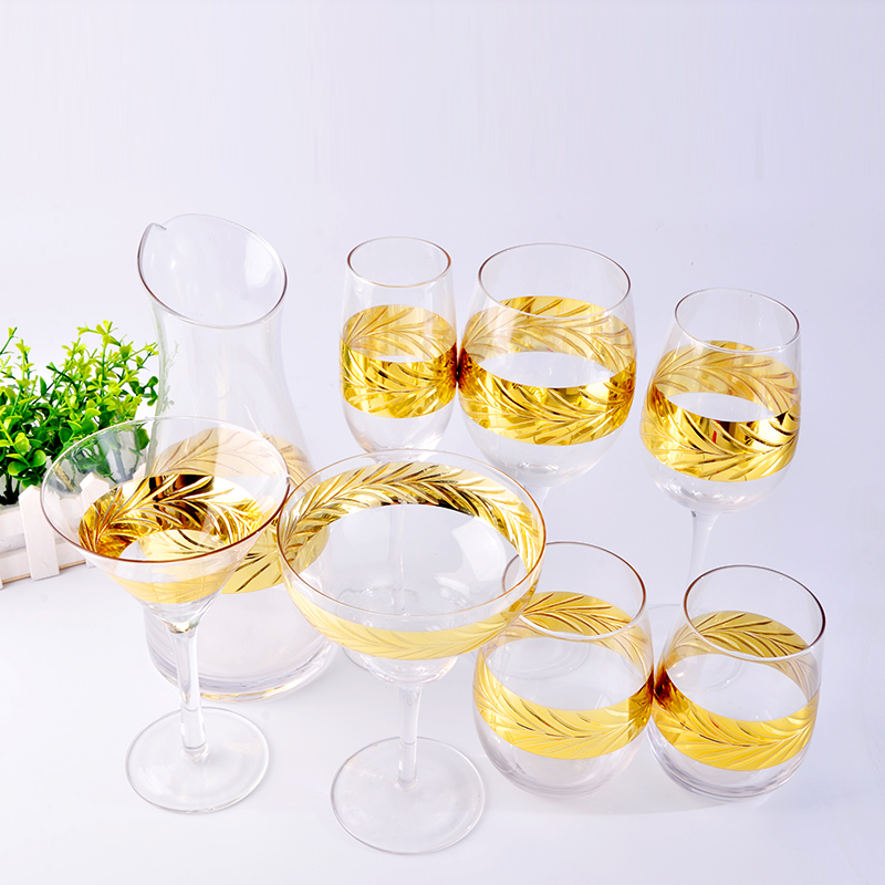 1 glass decanter and 7 glass drinkware with engraving golden pattern