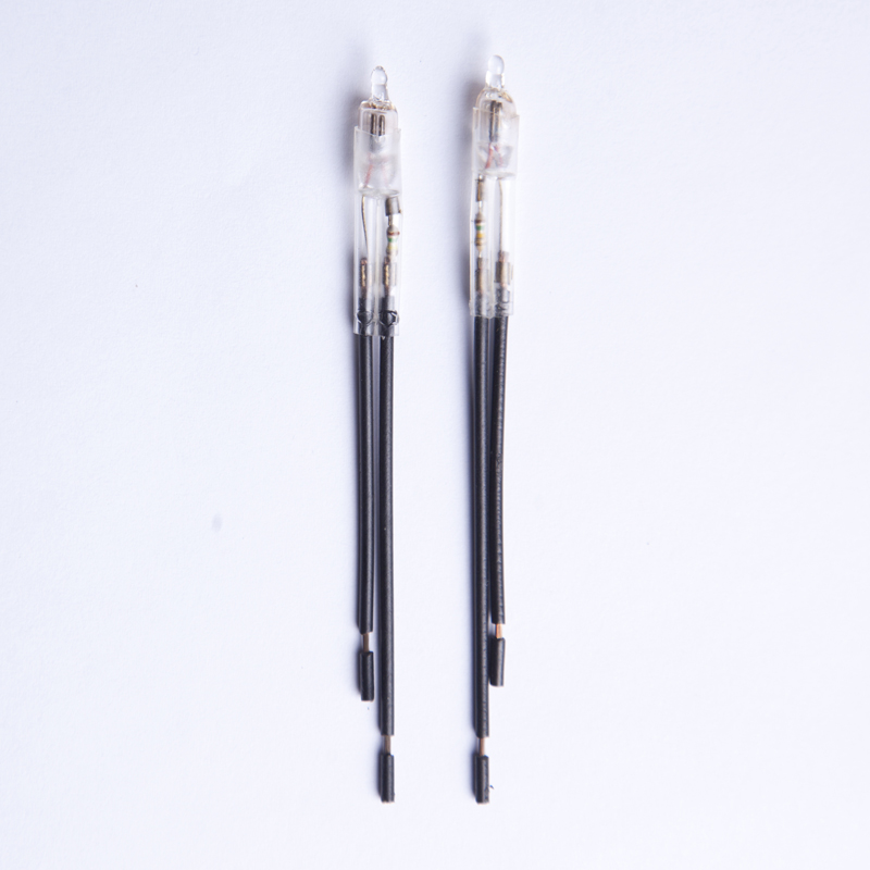 Neon lamp with resistor, cable and sleeve, resistor