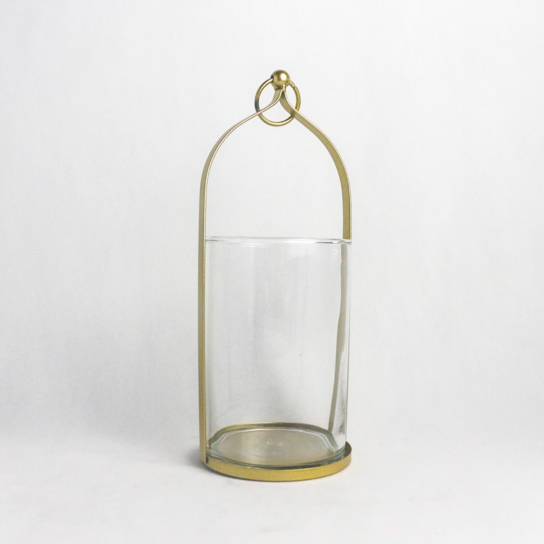 Transparent glass candle holder with golden metal base and hang