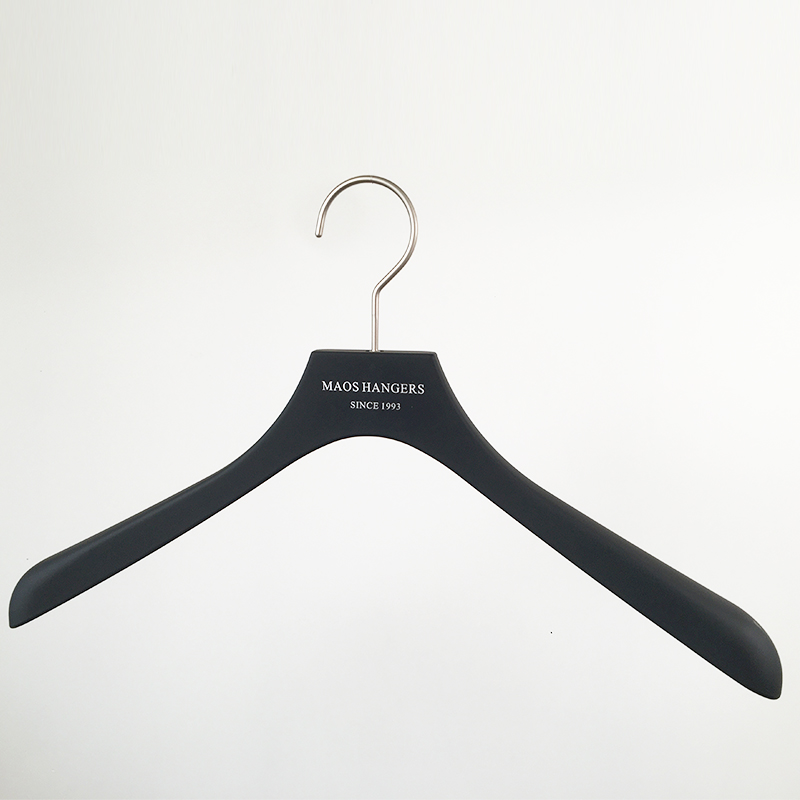Black plastic coat hanger with rubber coating