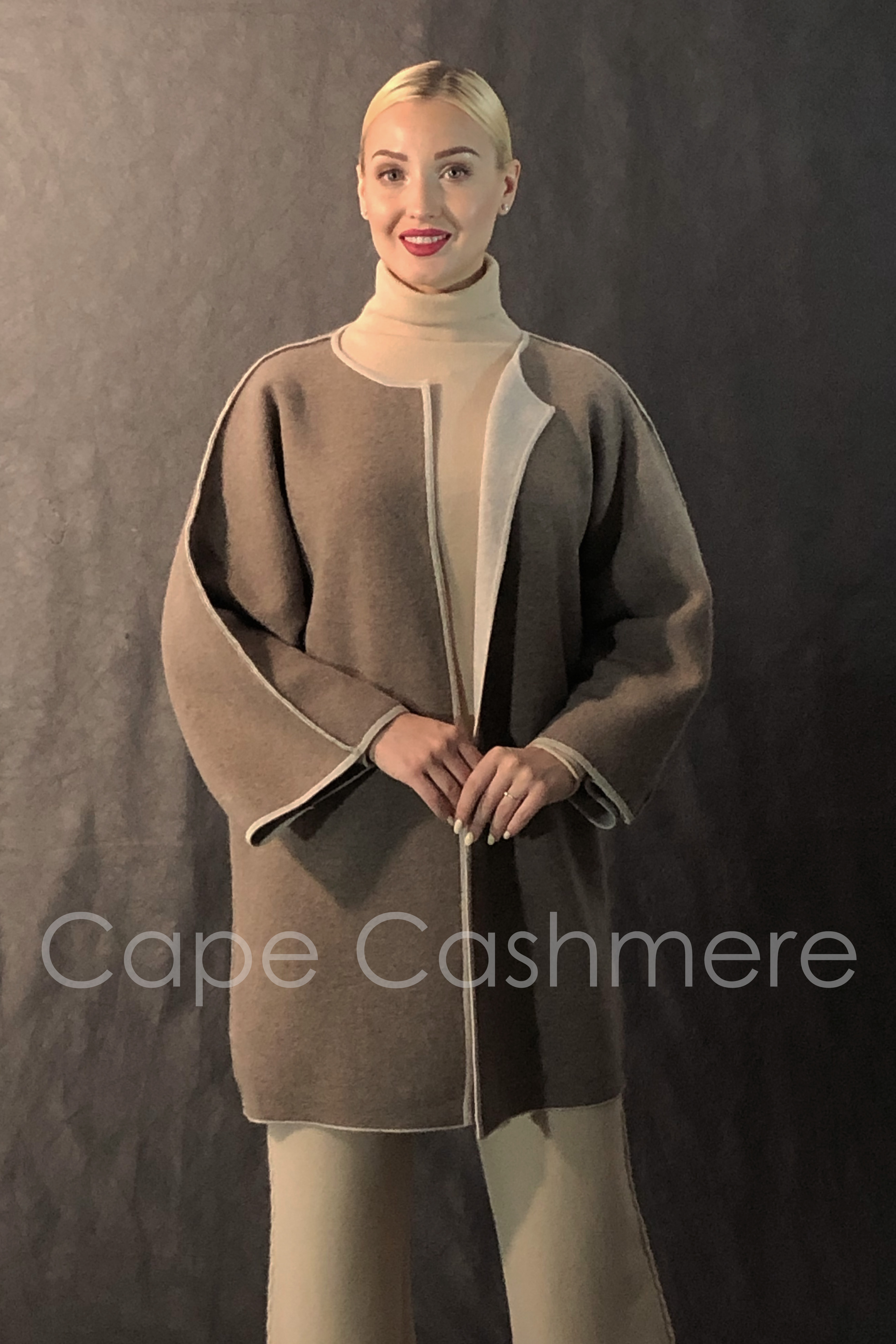 Knitting cashmere coat;poncho