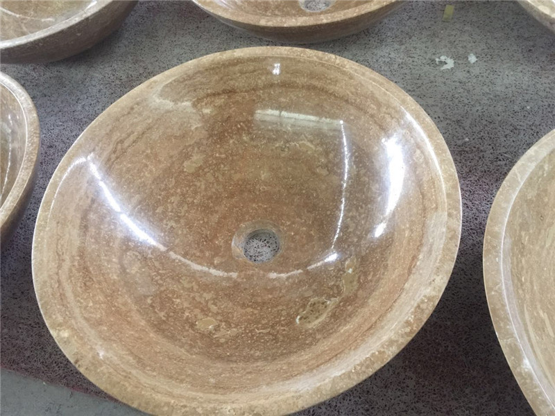 Beige travertine basins