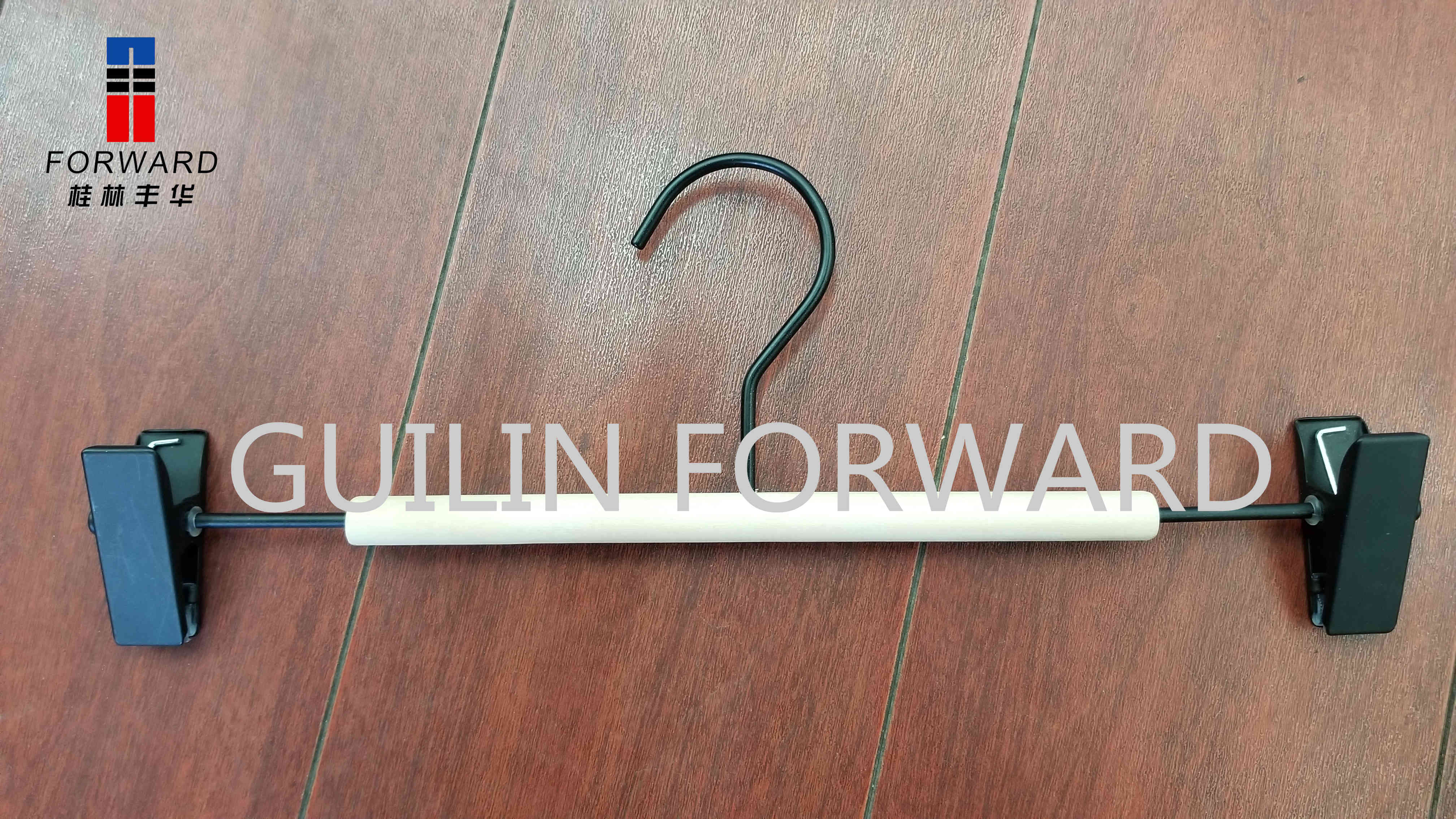 Metal pants hanger with wood