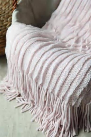 Ruffle warp knitting throw