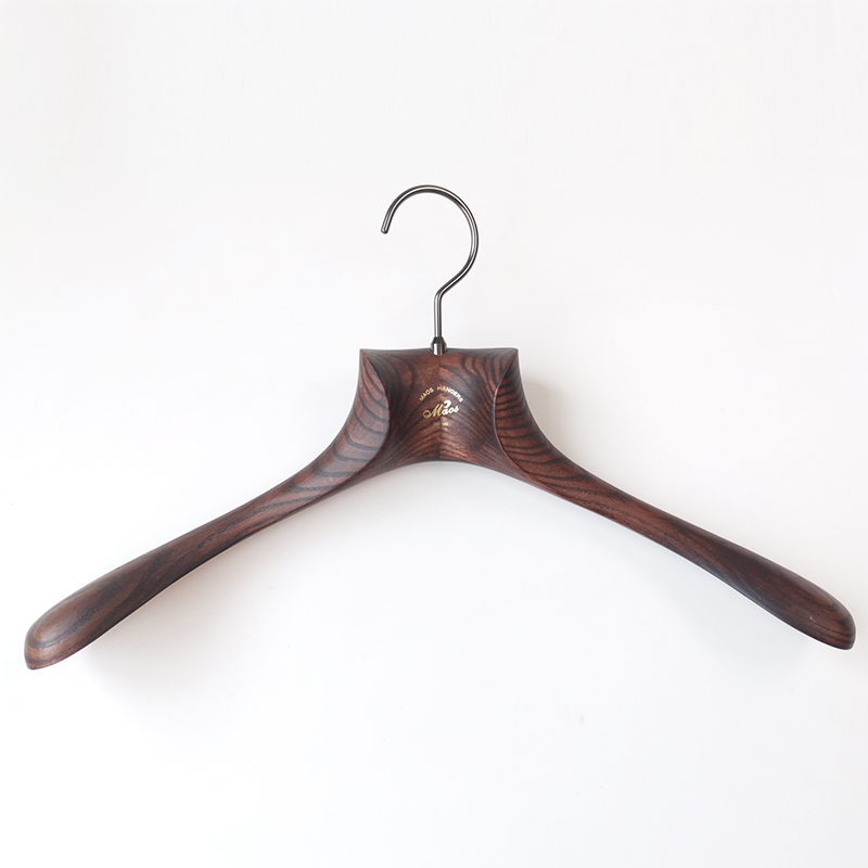 Deep brown ash wood top hanger with wide shoulders