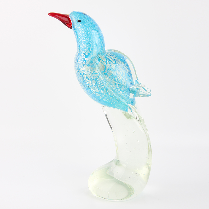 glass bird on base