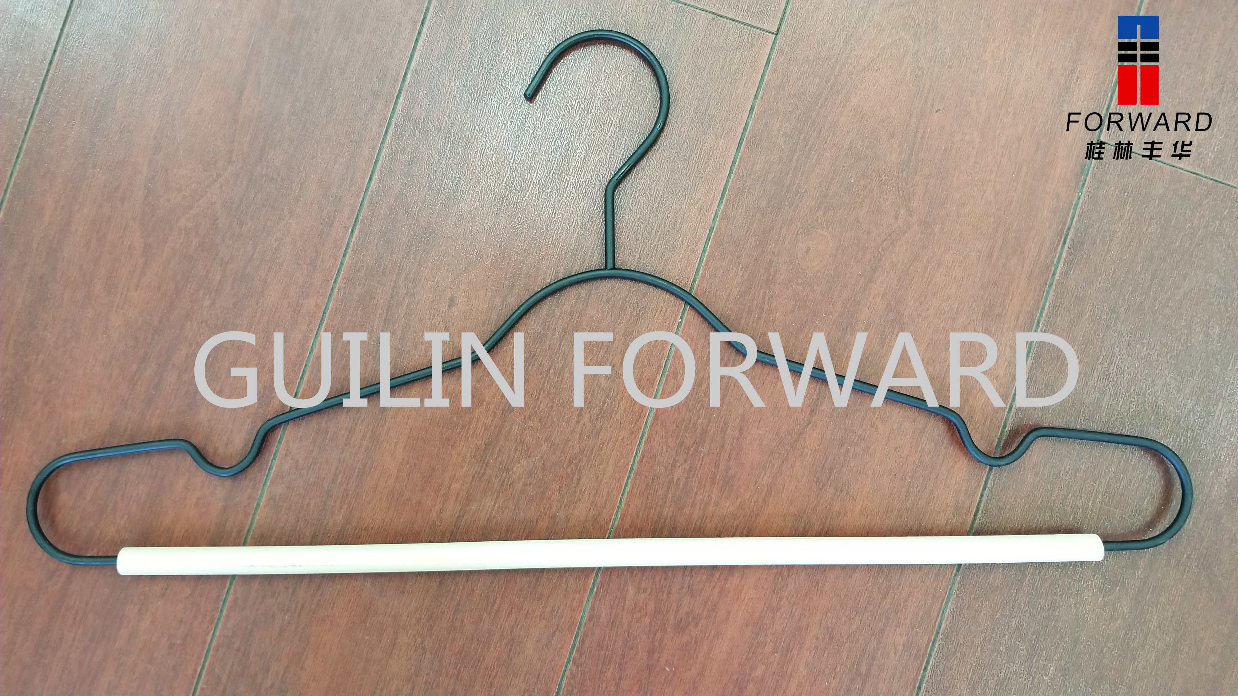 Metal hanger with wood