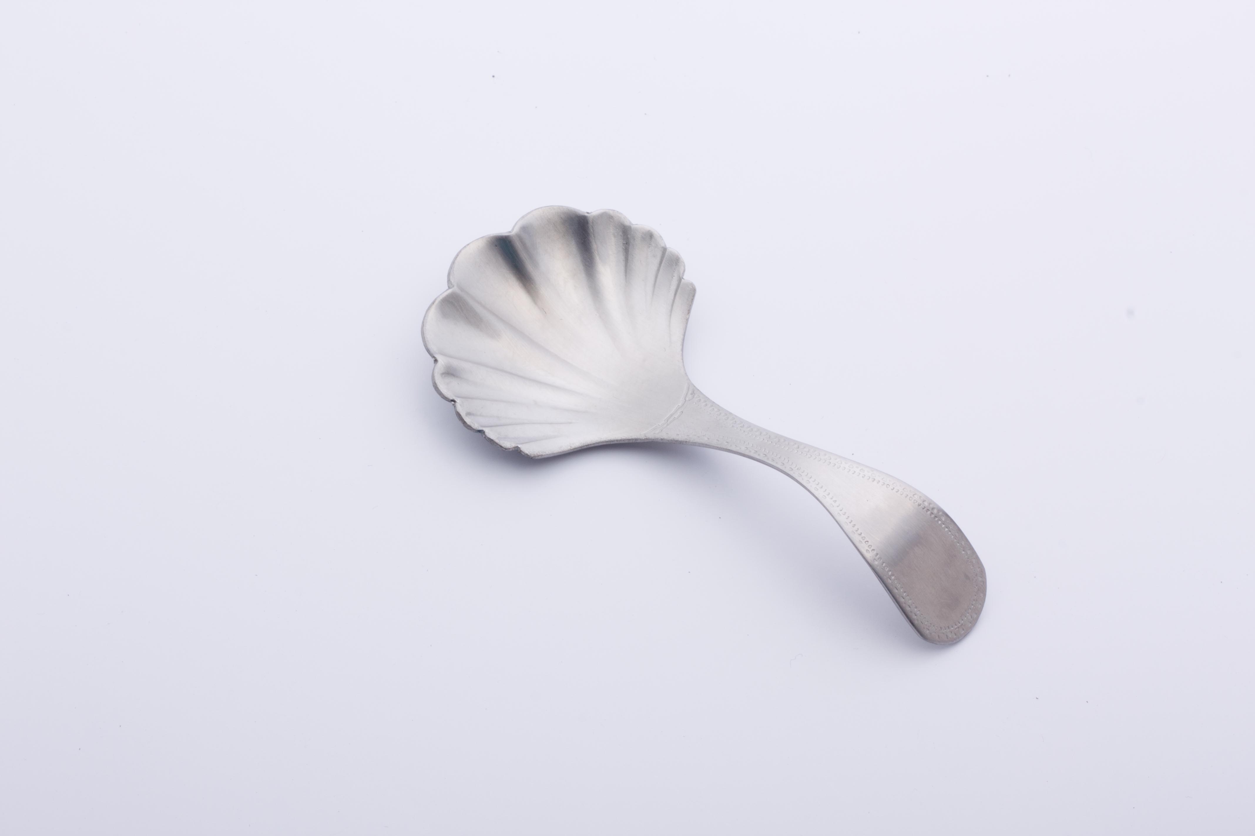 Stainless steel tea server-shell shape