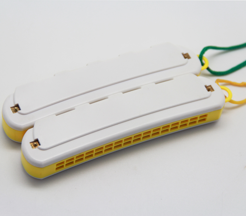 16 hole banana shape plastic cover toy harmonica