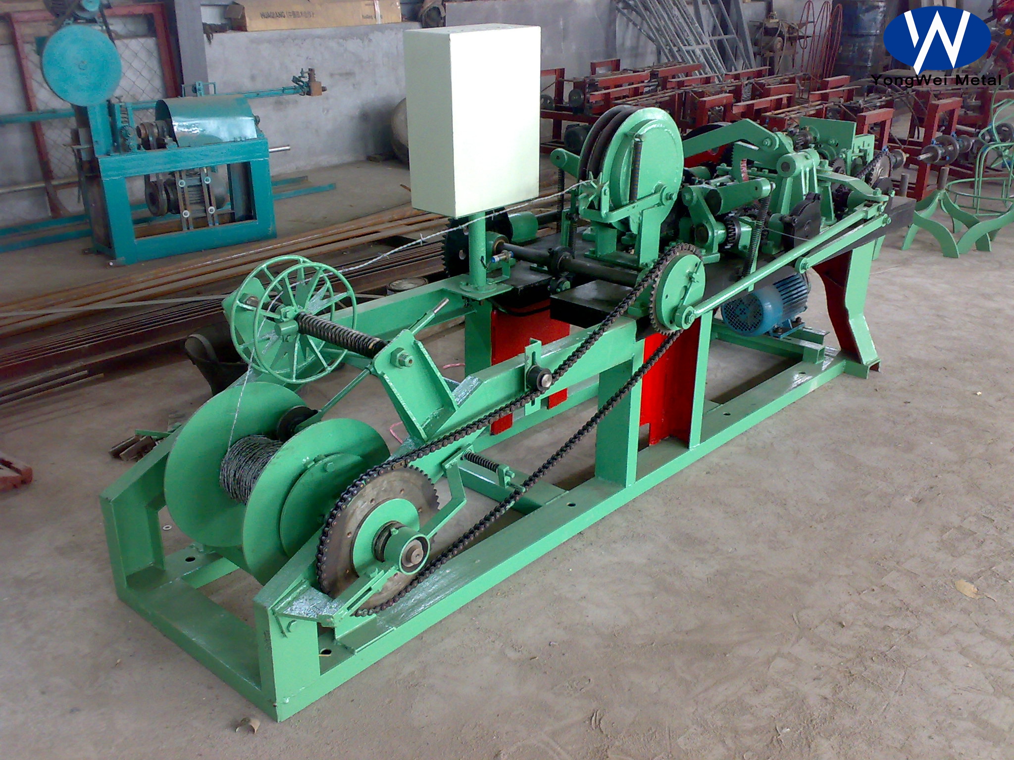 Barbed wire making machine