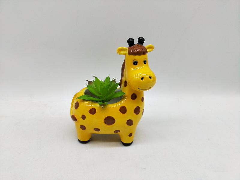 ceramic flower pot with fake plant