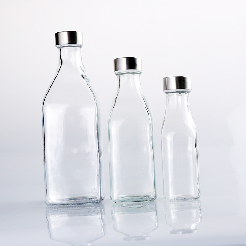 Glass bottle with iron lid