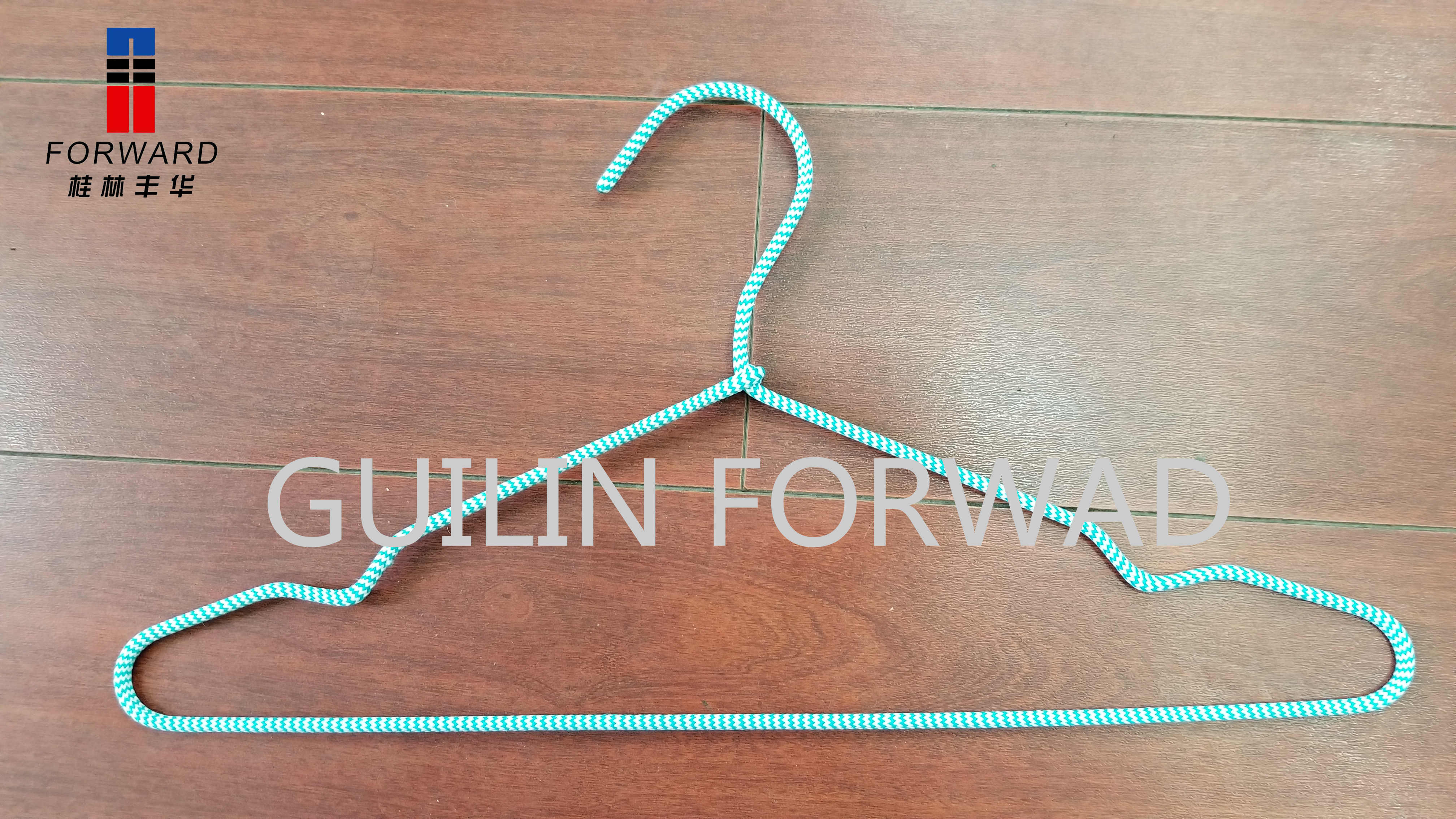 Metal hanger with fabric coated